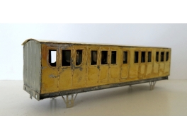 K166  Voiture Est 2 essieux portières et toilettes type AB4st